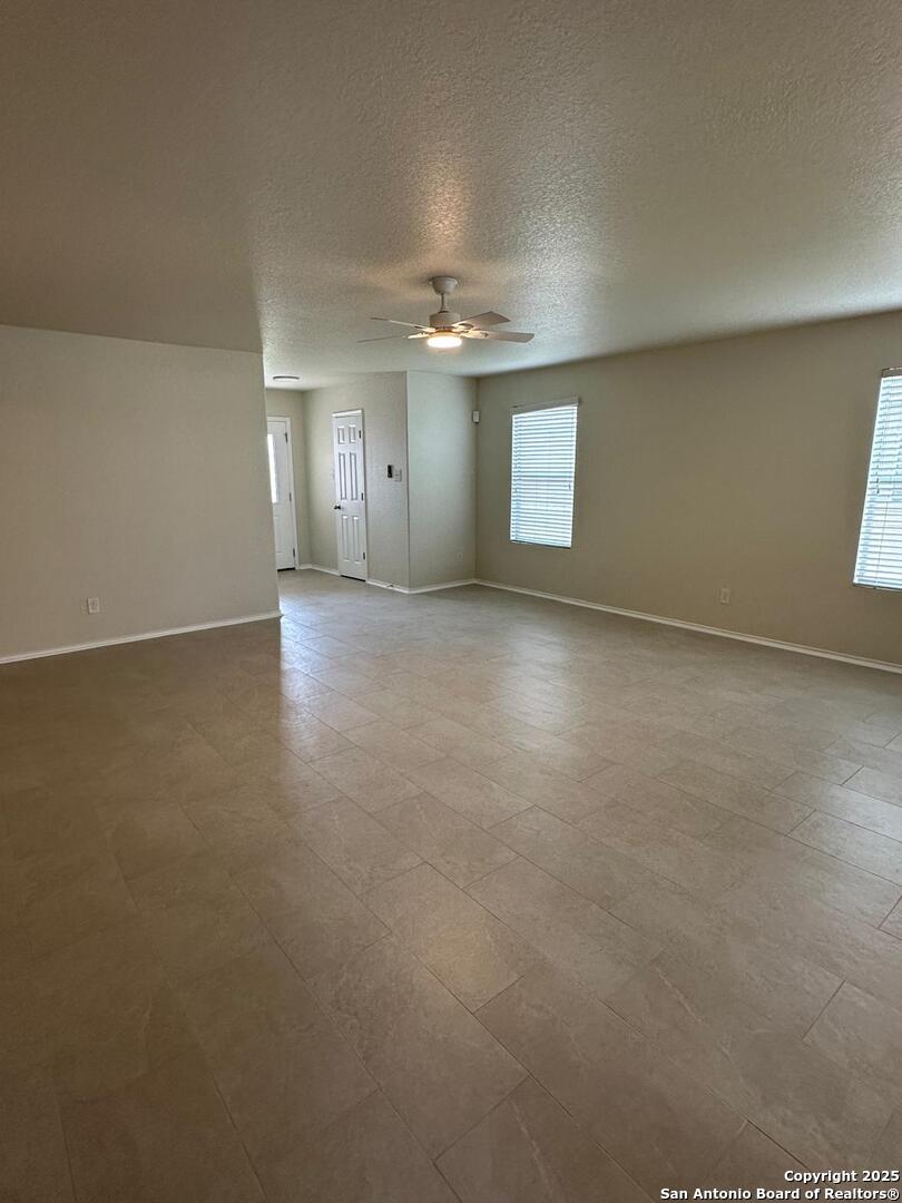 25346 Colt River San Antonio, TX 78261 - Photo 14 of 35 an empty room with a empty space and windows