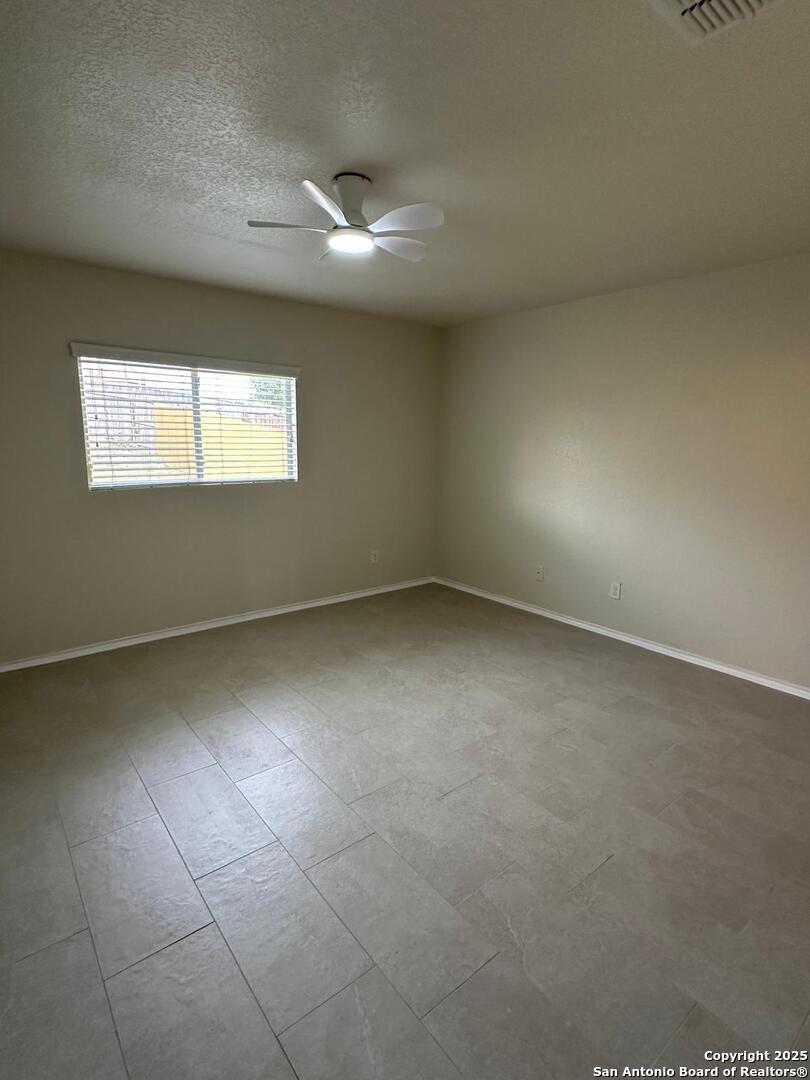 25346 Colt River San Antonio, TX 78261 - Photo 20 of 35 an empty room with windows