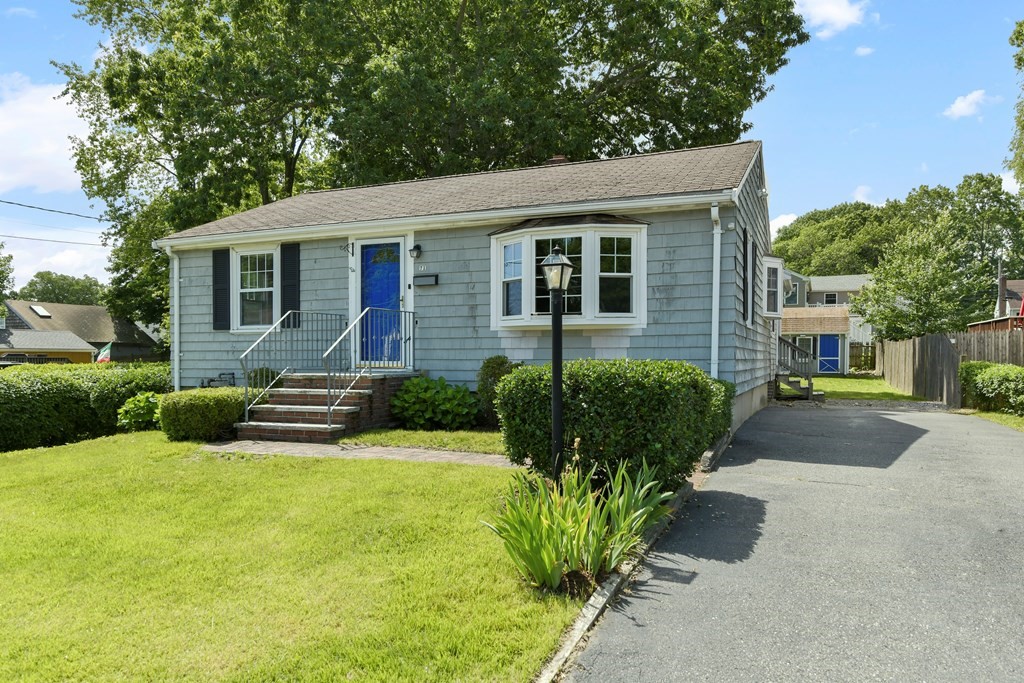 71 Paul Street Dedham, MA 02026 - Photo 1 of 22 a view of a house with backyard and sitting area