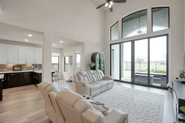 a view of living room with furniture and a window