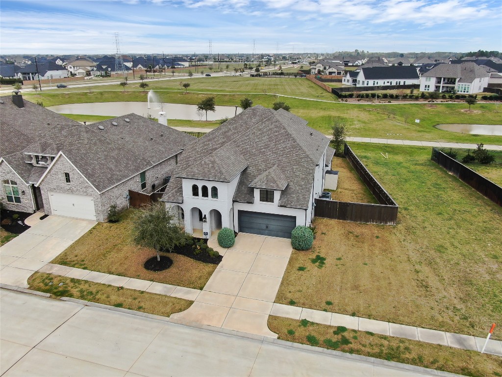 6718 Waxbill Road Katy, TX 77493 - Photo 2 of 48 an aerial view of a house with a ocean view
