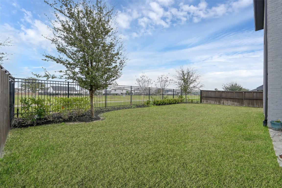6718 Waxbill Road Katy, TX 77493 - Photo 39 of 48 a view of a park with large trees