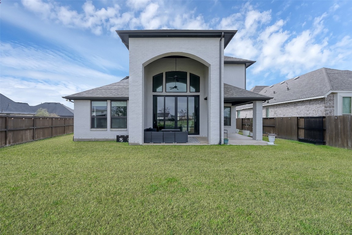 6718 Waxbill Road Katy, TX 77493 - Photo 41 of 48 a front view of a house with garden