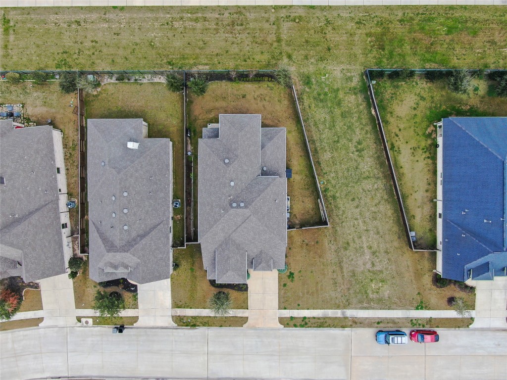 6718 Waxbill Road Katy, TX 77493 - Photo 44 of 48 an aerial view of residential house with outdoor space and lake view