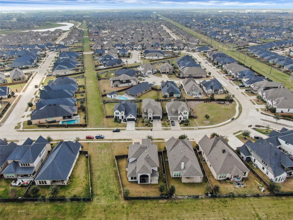 6718 Waxbill Road Katy, TX 77493 - Photo 46 of 48 an aerial view of residential houses with outdoor space