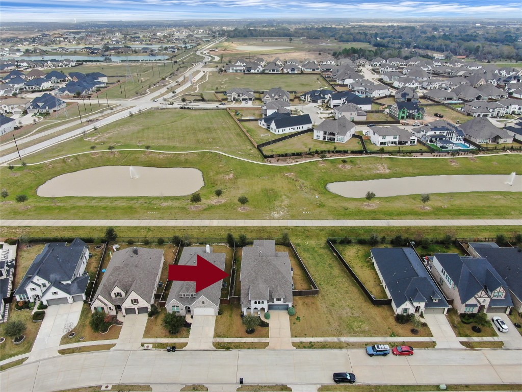 6718 Waxbill Road Katy, TX 77493 - Photo 47 of 48 an aerial view of residential houses with outdoor space
