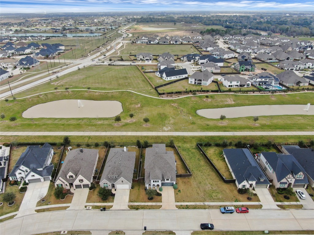 6718 Waxbill Road Katy, TX 77493 - Photo 48 of 48 an aerial view of residential houses with outdoor space