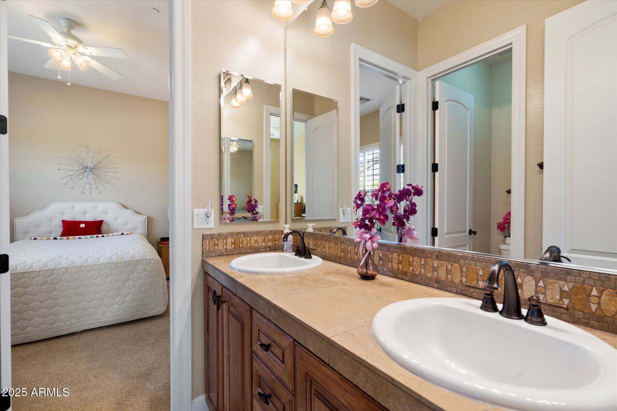 3132 East Harwell Road Phoenix, AZ 85042 - Photo 26 of 36 jack-n-jill bathroom