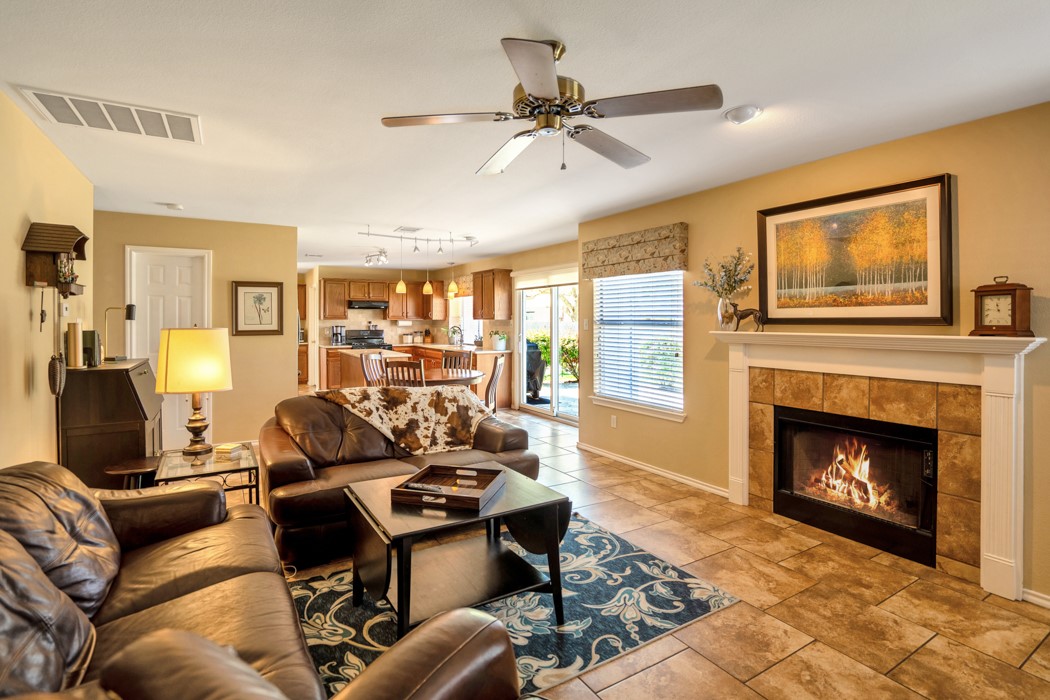 412 Derby Lane Georgetown, TX 78626 - Photo 12 of 37 a living room with furniture fireplace and a window