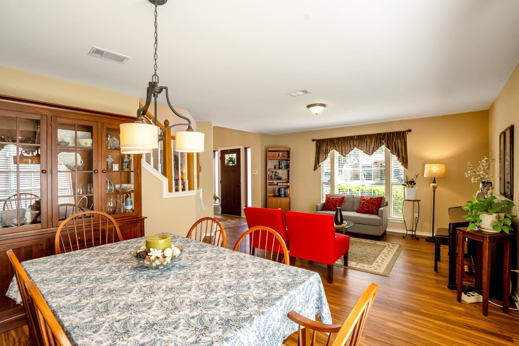 412 Derby Lane Georgetown, TX 78626 - Photo 6 of 37 a living room with furniture a window and wooden floor