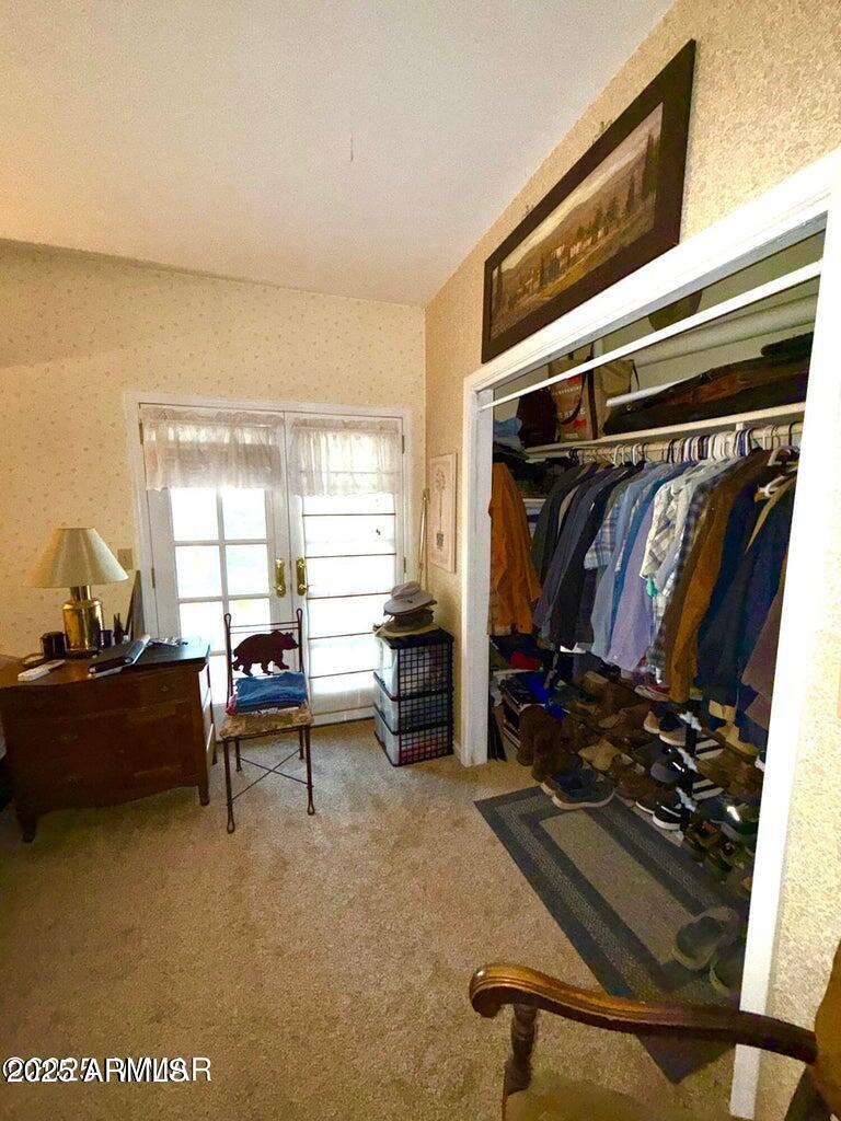 280 County Road Concho, AZ 85924 - Photo 25 of 46 a living room with a couch and a window
