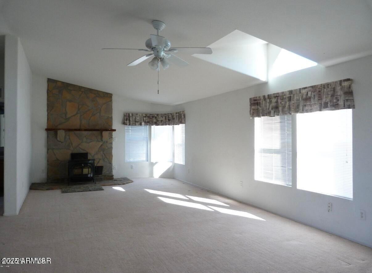 280 County Road Concho, AZ 85924 - Photo 42 of 46 a view of empty room with a ceiling fan and window