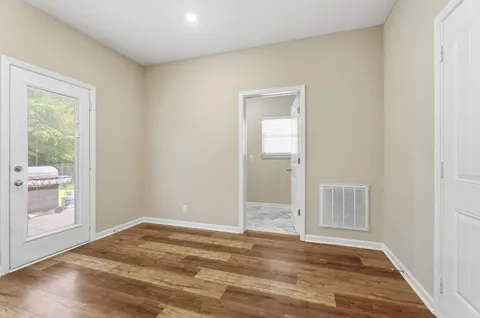 a view of an empty room and window