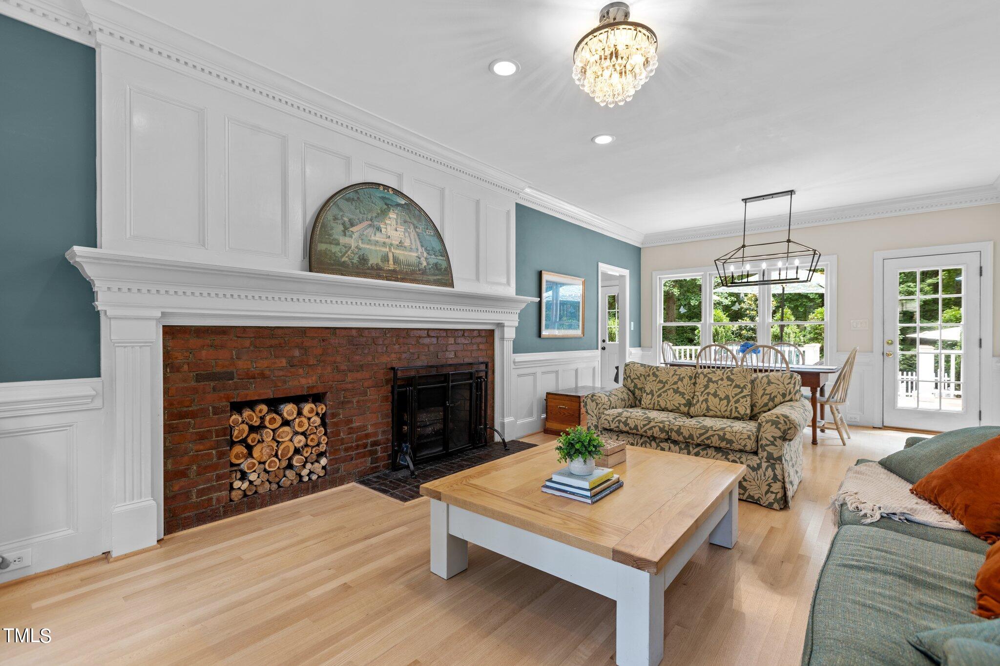 300 Key Court Raleigh, NC 27614 - Photo 25 of 85 a living room with furniture and a fireplace