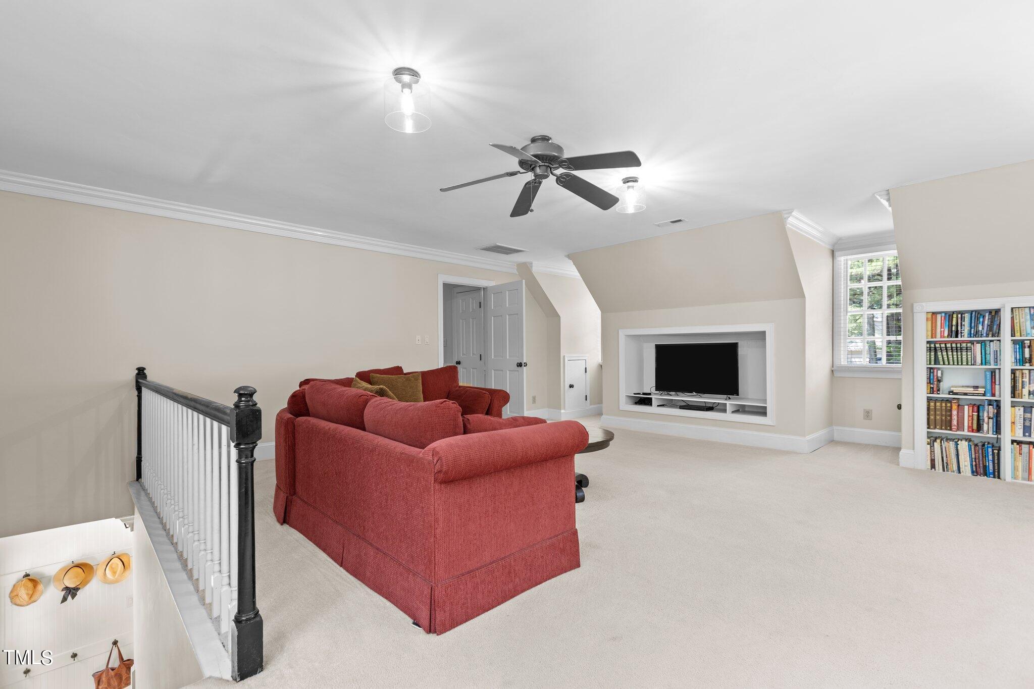 300 Key Court Raleigh, NC 27614 - Photo 31 of 85 a living room with furniture and a fireplace