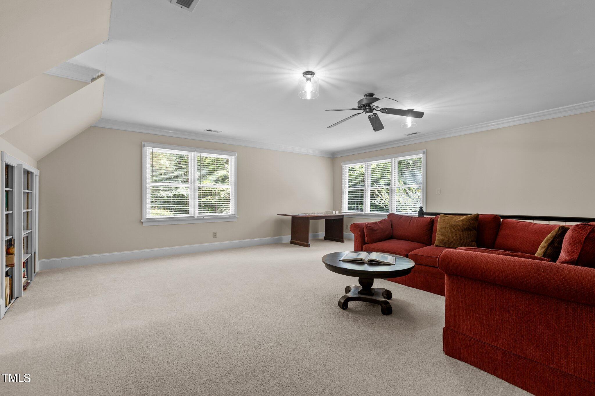 300 Key Court Raleigh, NC 27614 - Photo 33 of 85 a living room with furniture and a window