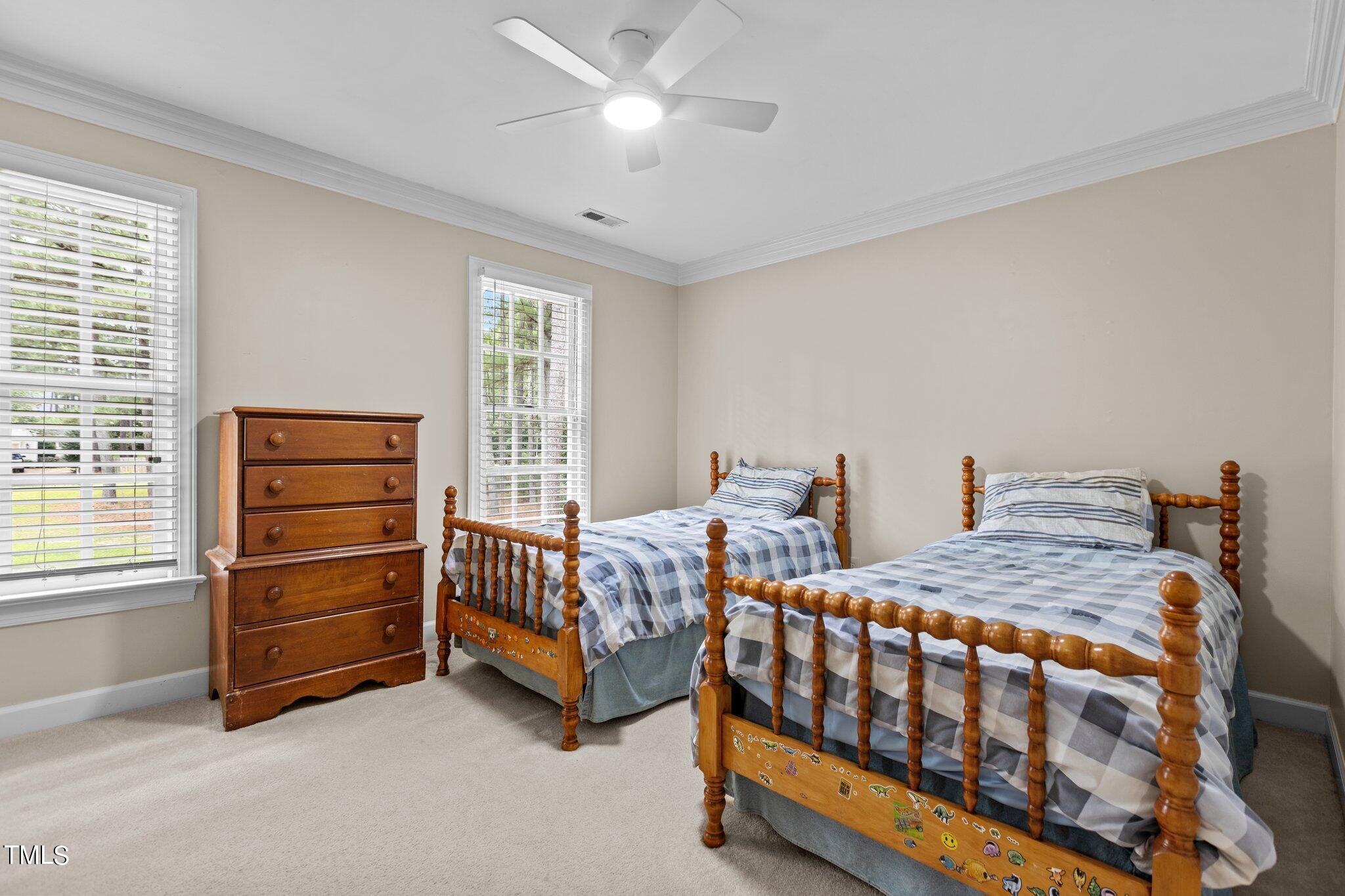 300 Key Court Raleigh, NC 27614 - Photo 36 of 85 a bedroom with two beds and window