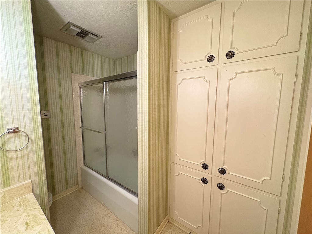 702 Matous Drive Bryan, TX 77802 - Photo 22 of 28 Hall Bathroom with Large Linen Closet