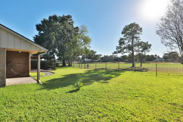a view of outdoor space with wooden floor