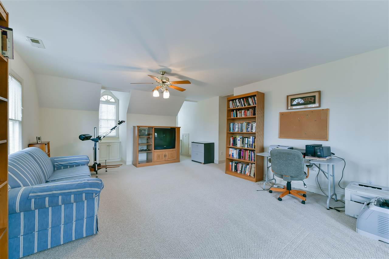 6017 Glenthorne Drive Raleigh, NC 27613 - Photo 11 of 13 This large Bonus Room features tons of natural light. On the second floor off the main hall with back stairs down to the kitchen and half bath. Plenty of room for entertaining or family nights. Bonus Room