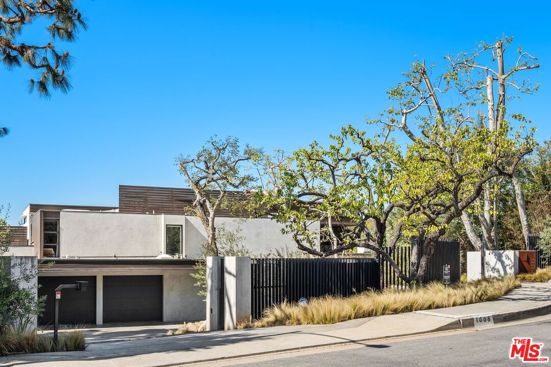 1005 Elden Way Beverly Hills, CA 90210 - Photo 4 of 62 a view of a house with a tree