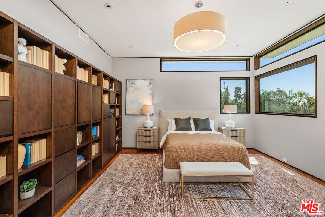 1005 Elden Way Beverly Hills, CA 90210 - Photo 48 of 62 a living room with furniture and a window