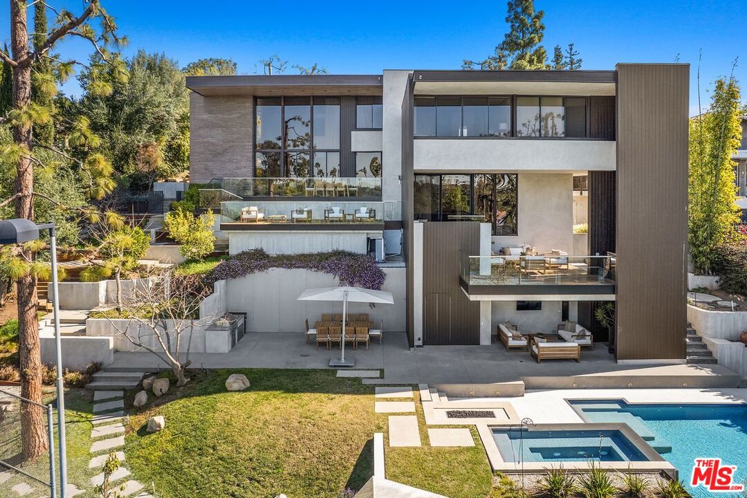 1005 Elden Way Beverly Hills, CA 90210 - Photo 56 of 62 a view of a house with swimming pool