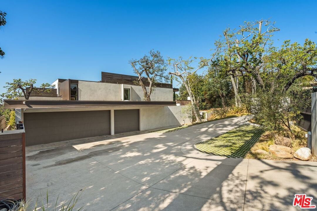 1005 Elden Way Beverly Hills, CA 90210 - Photo 6 of 62 a view of a house with a outdoor space