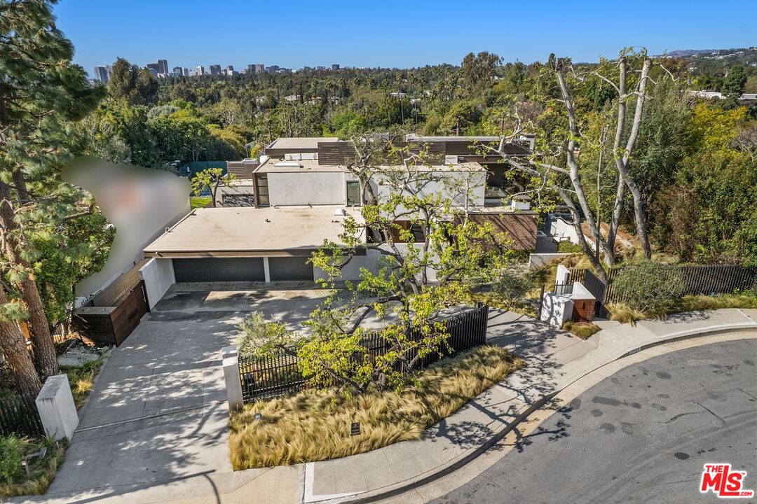 1005 Elden Way Beverly Hills, CA 90210 - Photo 62 of 62 a view of a houses with a yard