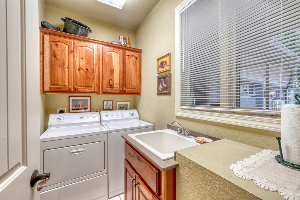 197 Eagles View Road Hayesville, NC 28904 - Photo 22 of 53 a utility room with a sink washer and dryer