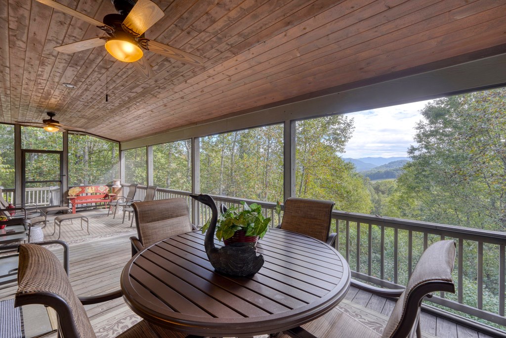 197 Eagles View Road Hayesville, NC 28904 - Photo 3 of 53 a living room with furniture and a large window
