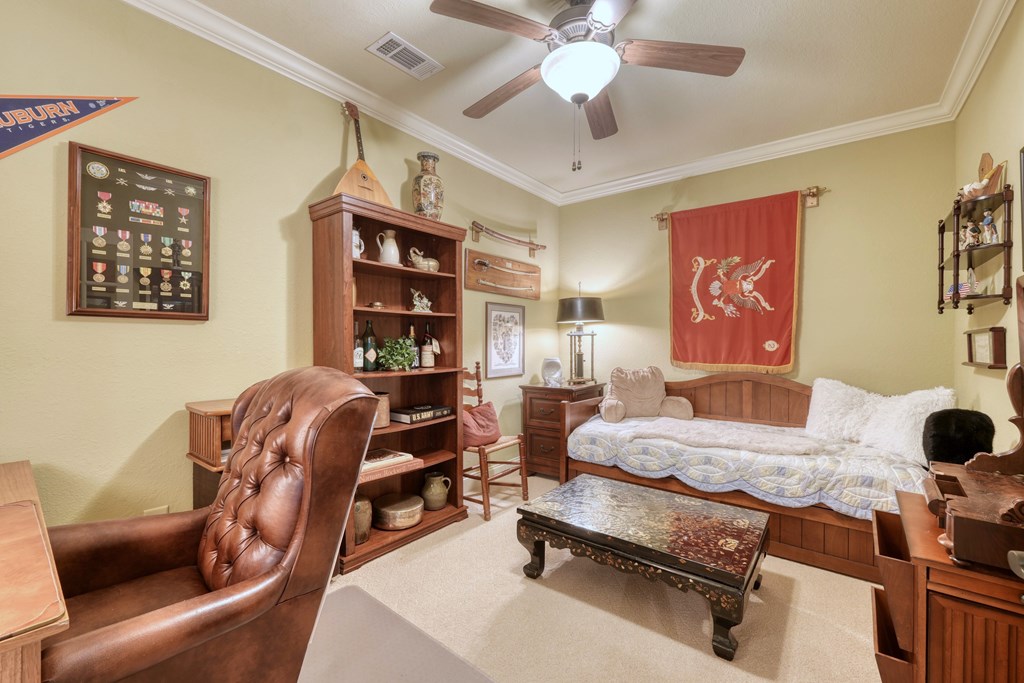 197 Eagles View Road Hayesville, NC 28904 - Photo 33 of 53 a bedroom with furniture and a chandelier