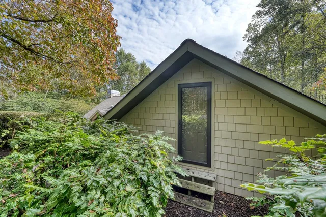 a backyard of a house with lots of green space