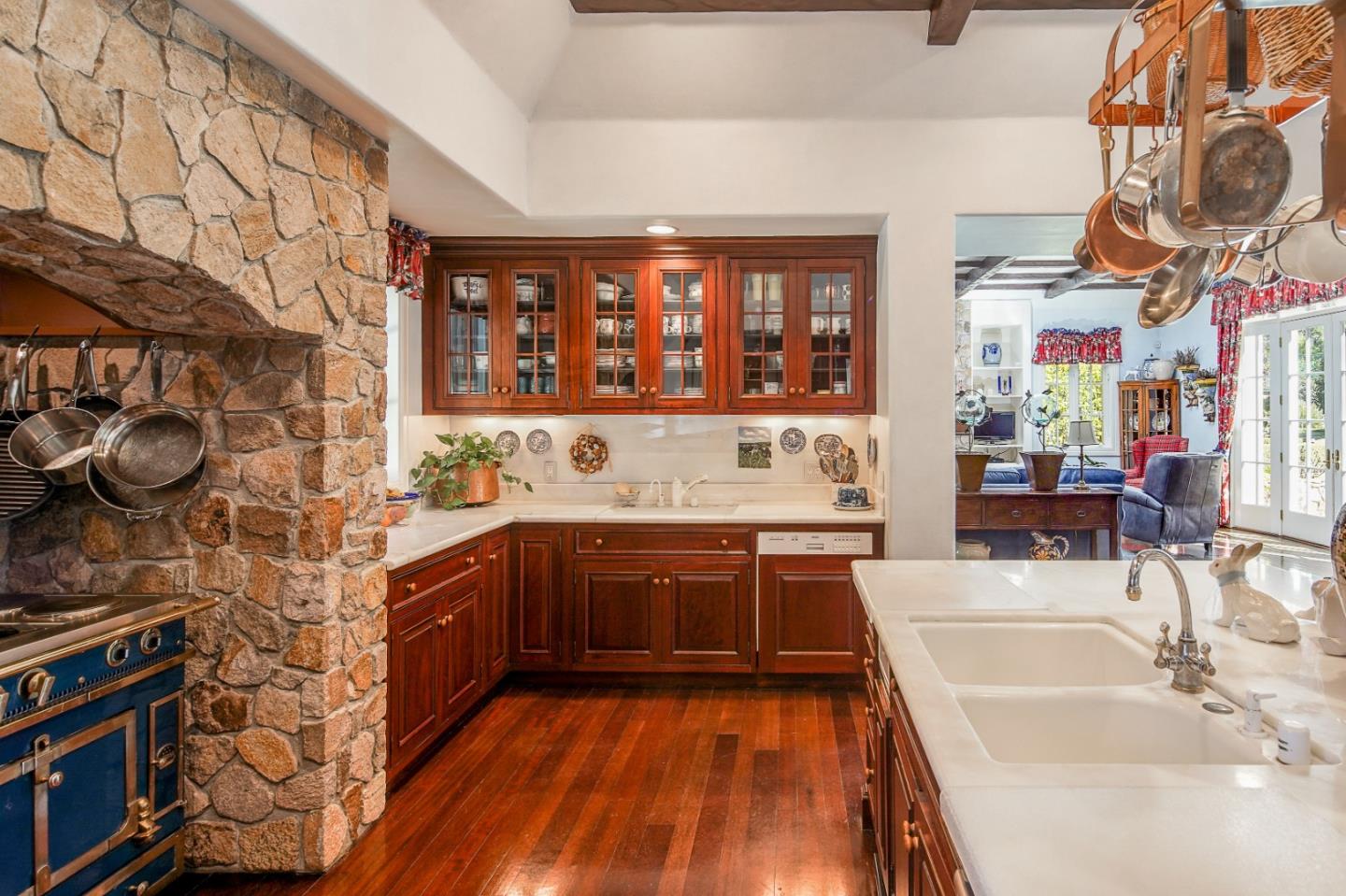 12 Ring Lane Carmel Valley, CA 93924 - Photo 23 of 73 a large kitchen with stainless steel appliances granite countertop a sink and wooden cabinets