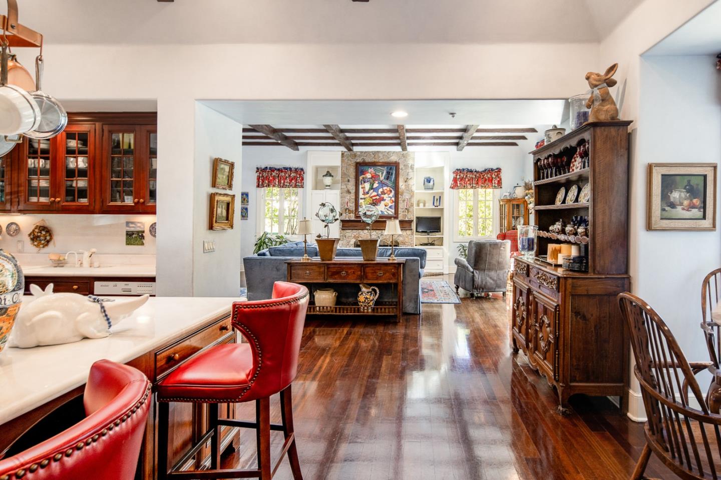 12 Ring Lane Carmel Valley, CA 93924 - Photo 25 of 73 a living room with furniture a rug and a bookshelf
