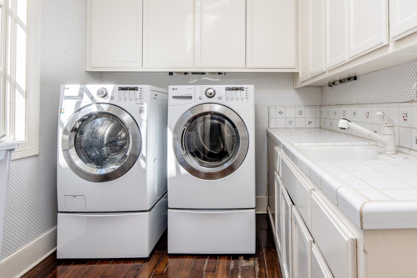 12 Ring Lane Carmel Valley, CA 93924 - Photo 29 of 73 a utility room with dryer and washer