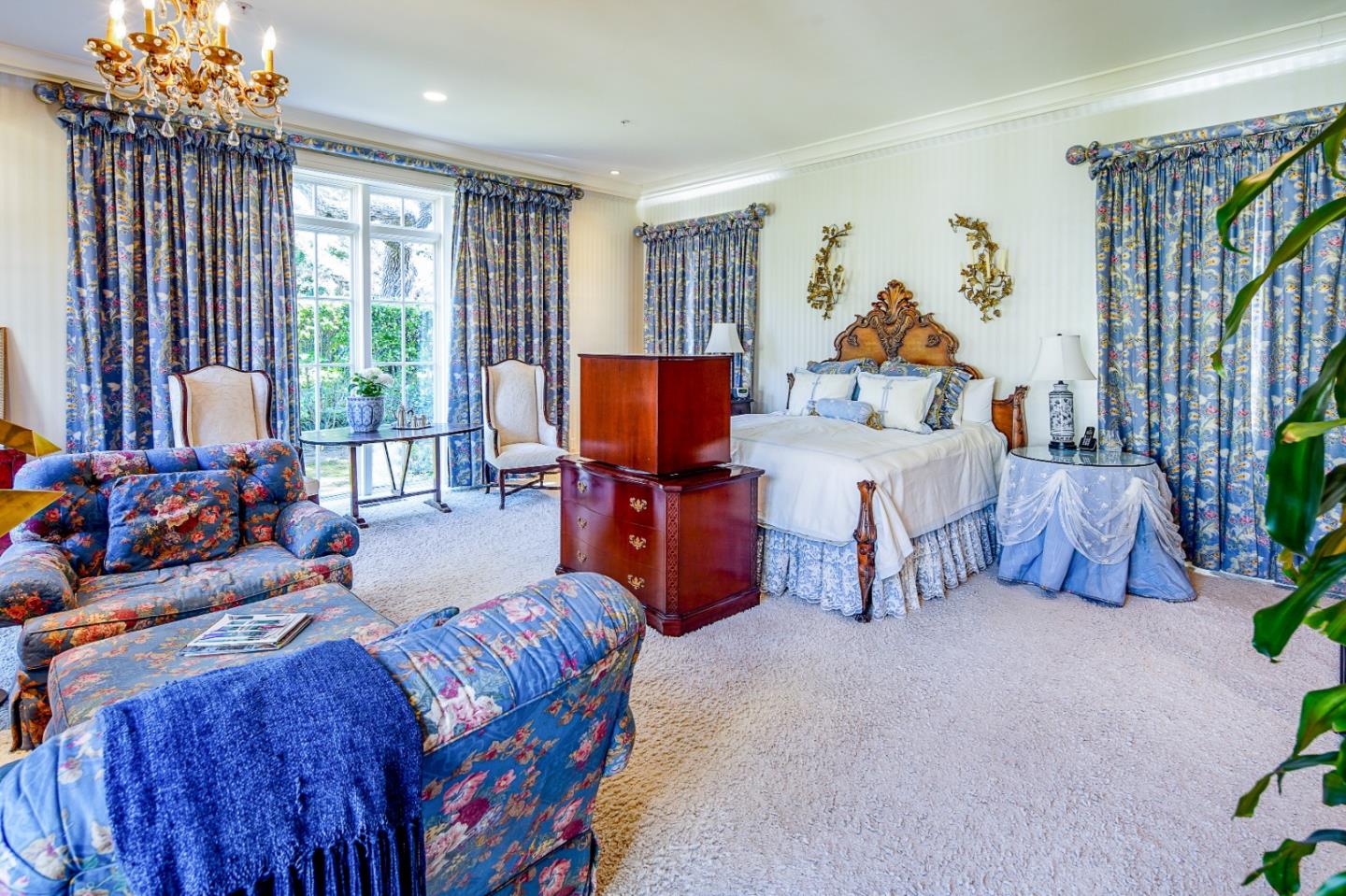 12 Ring Lane Carmel Valley, CA 93924 - Photo 34 of 73 a living room with furniture and a flat screen tv
