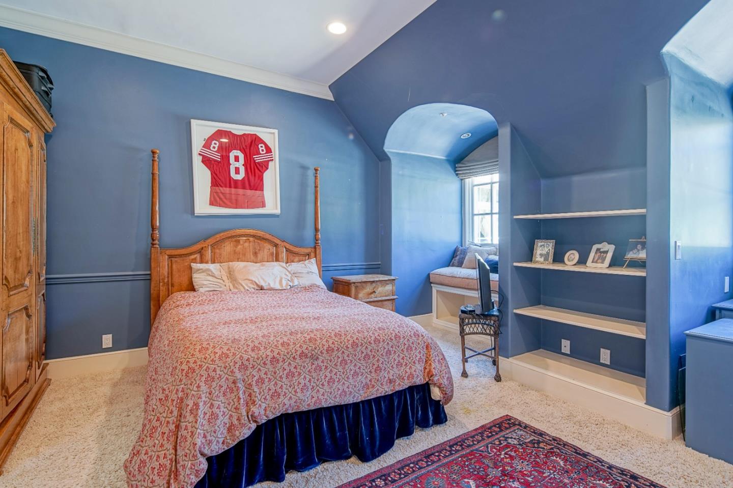 12 Ring Lane Carmel Valley, CA 93924 - Photo 41 of 73 a bedroom with a bed a dresser and book shelf