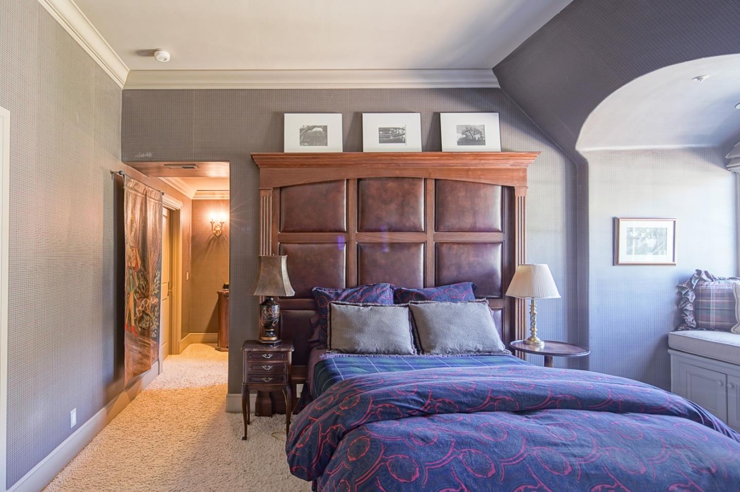 12 Ring Lane Carmel Valley, CA 93924 - Photo 42 of 73 a bedroom with a bed and wooden floor