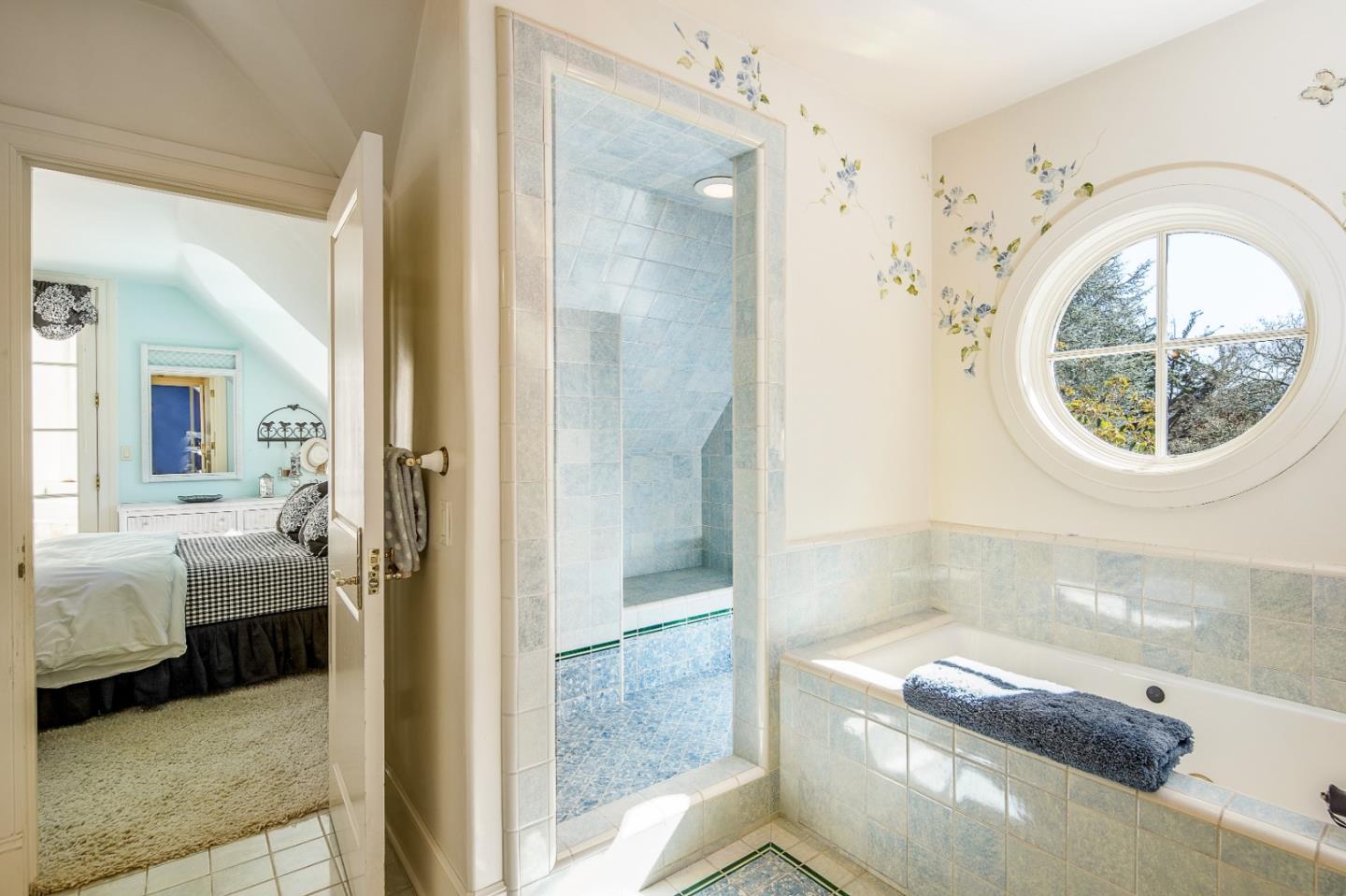 12 Ring Lane Carmel Valley, CA 93924 - Photo 47 of 73 a bathroom with a tub sink and mirror