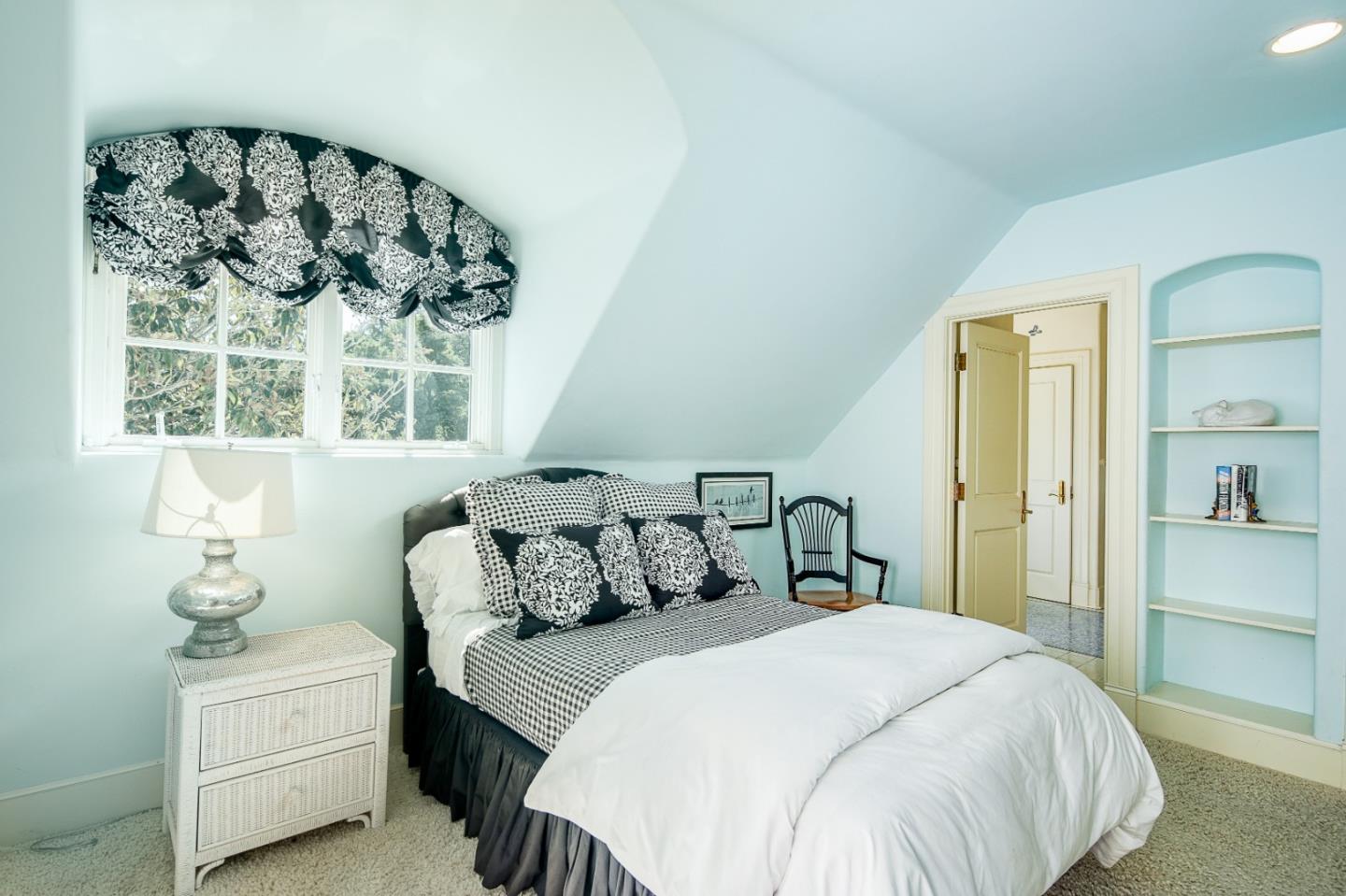 12 Ring Lane Carmel Valley, CA 93924 - Photo 50 of 73 a bedroom with a bed and a window