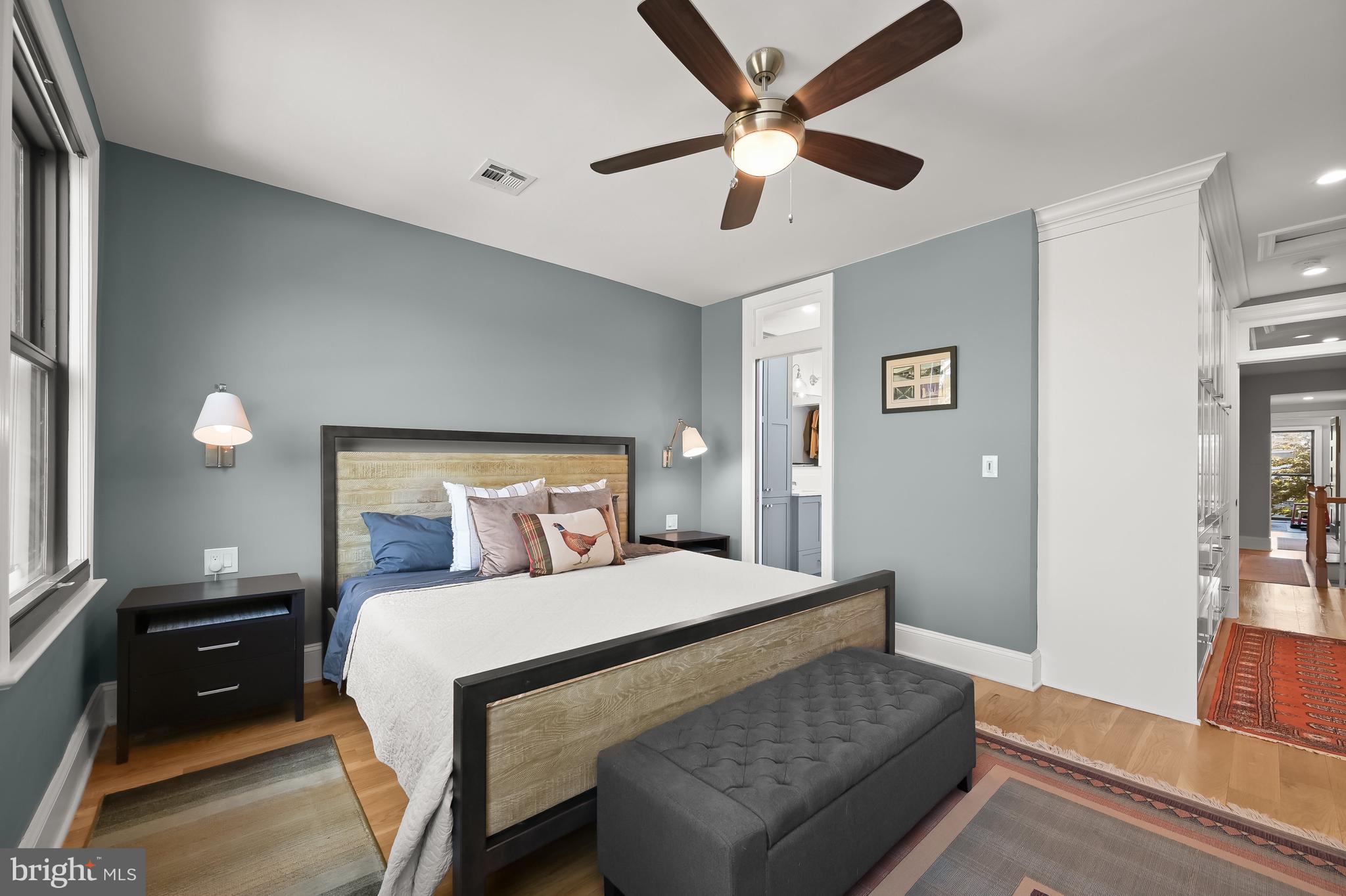 1733 11th Street Northwest Washington, DC 20001 - Photo 11 of 21 a bedroom with a bed and wooden floor