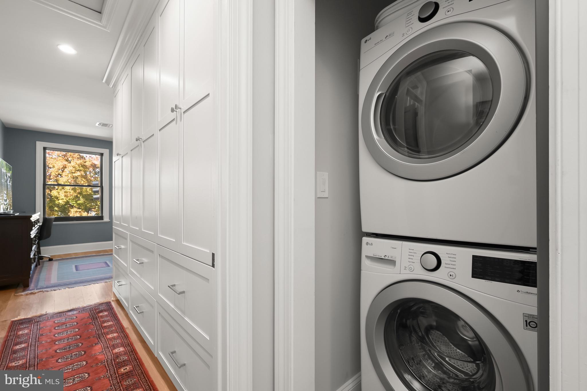 1733 11th Street Northwest Washington, DC 20001 - Photo 13 of 21 a view of a hallway with washer and dryer