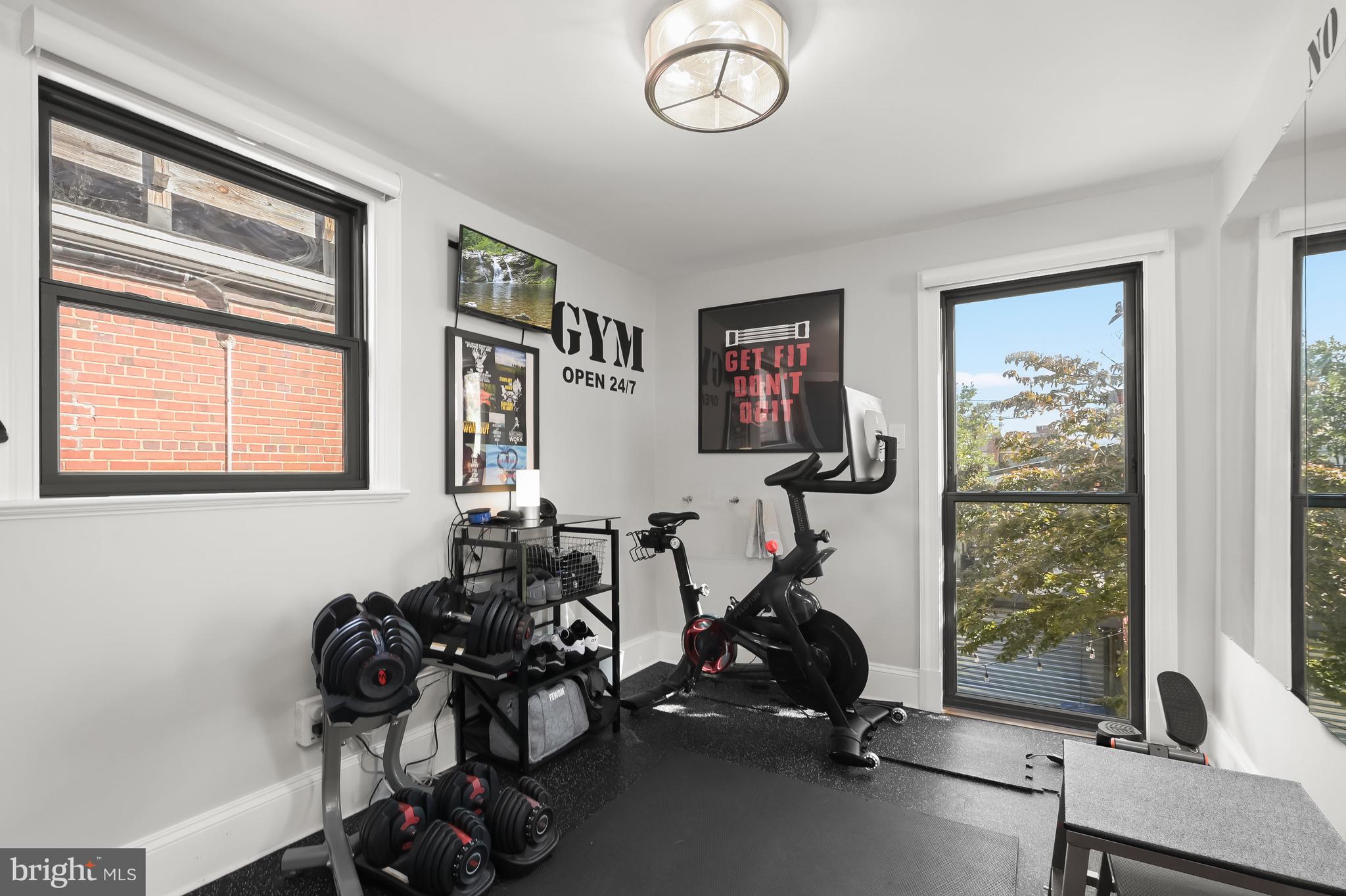 1733 11th Street Northwest Washington, DC 20001 - Photo 16 of 21 a view of a room with gym equipment