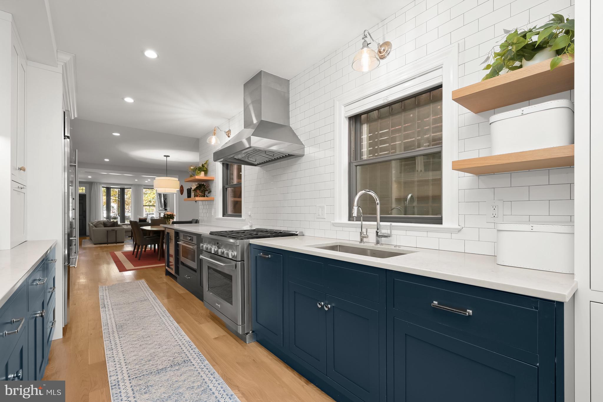 1733 11th Street Northwest Washington, DC 20001 - Photo 8 of 21 a kitchen with lots of counter space and a sink