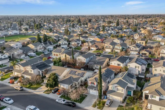 an aerial view of a city with lots of residential buildings