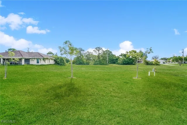 a view of a golf course with a garden