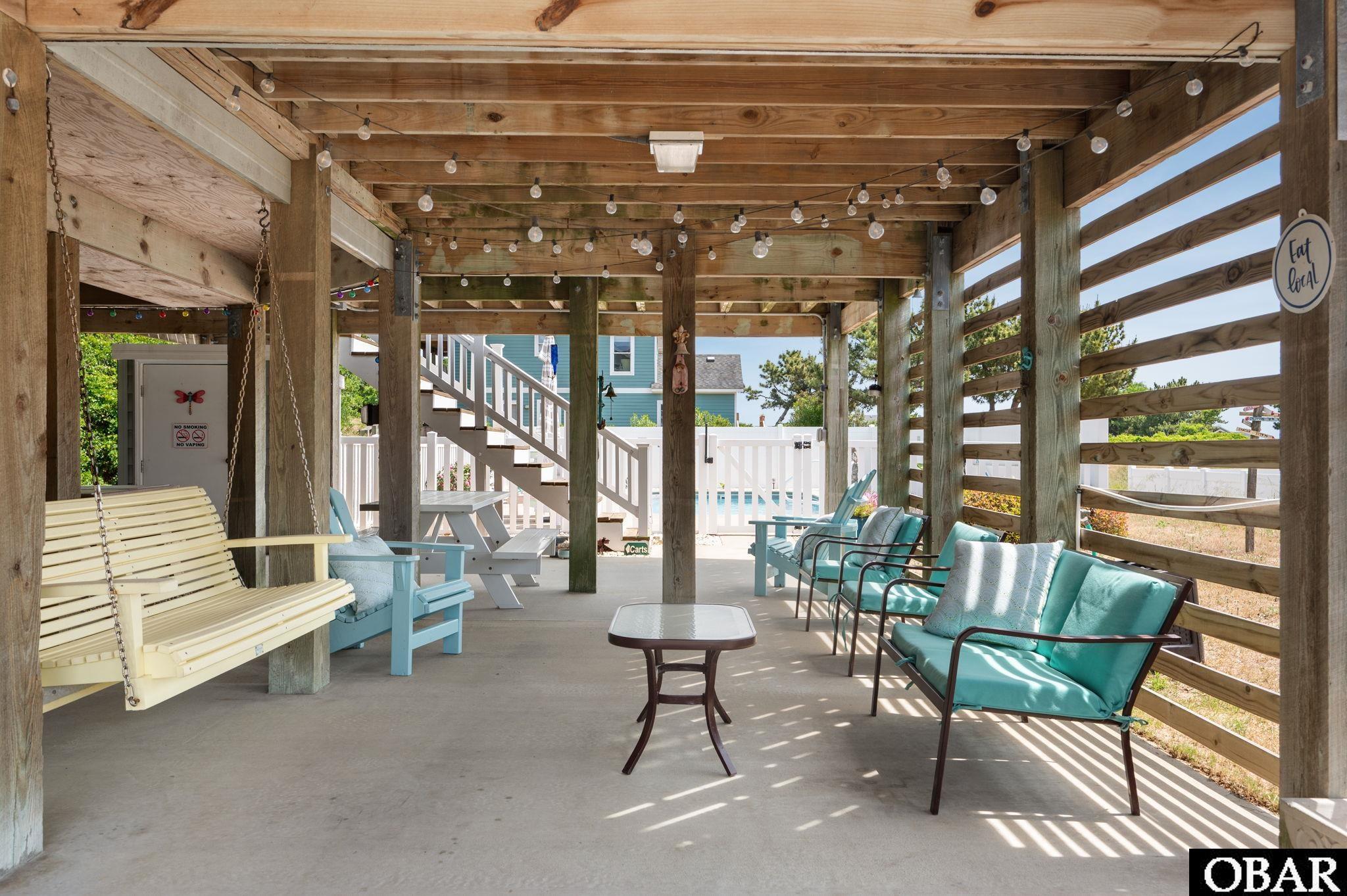 4705 Summer, Unit 2 Kitty Hawk, NC 27949 - Photo 5 of 17 Shaded Outdoor Living Space