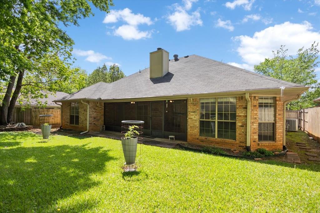 2824 Crestview Avenue Tyler, TX 75701 - Photo 34 of 39 a front view of a house with a yard