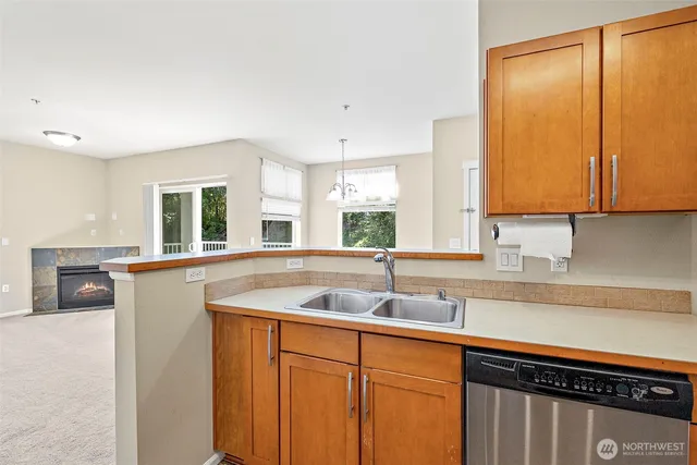 a kitchen with a stove and a microwave